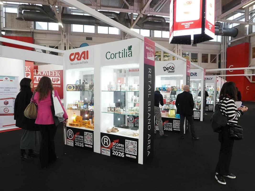 Home and personal-care products displayed within a branded non-food exhibition stand at MARCA 2026.